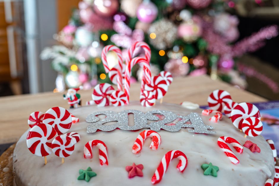 Delicious holiday cake topped with peppermint candies and 2024 decorations.